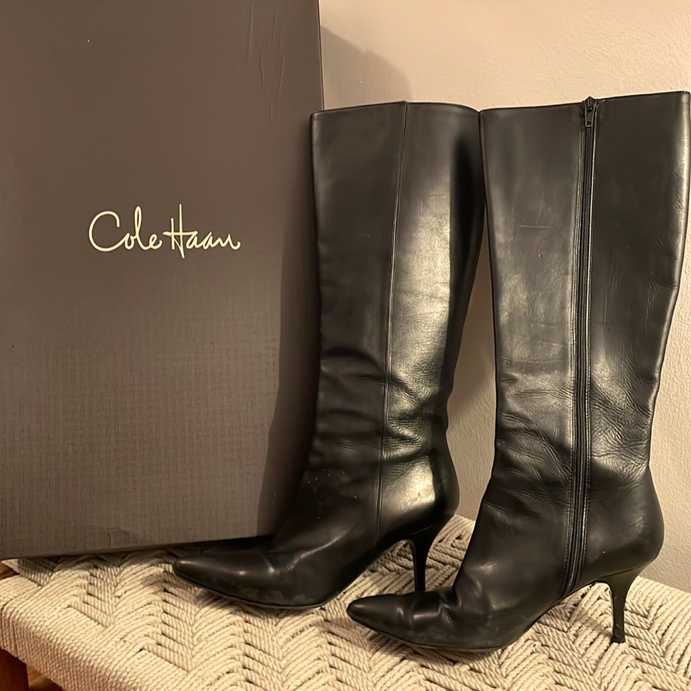 Women’s Cole Haan tall black long black leather heeled boots. Size 7.5